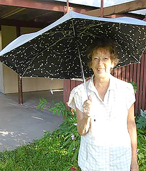 Ann umbrellas on the bridge