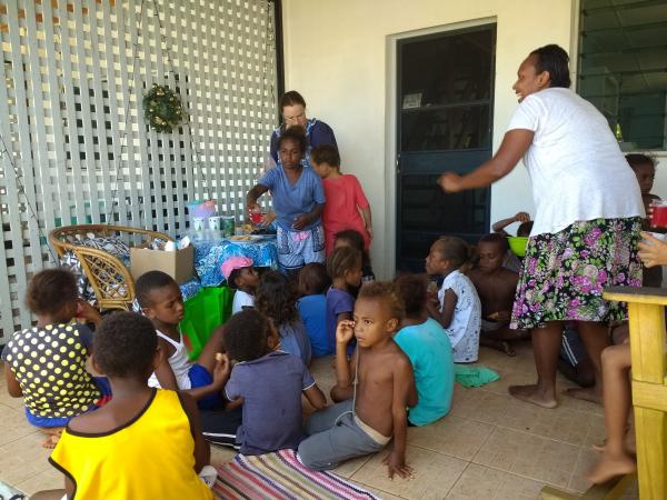 VSA er Leesa and Bislama teacher Gael and the children of the community at my house after community rubbish clean up