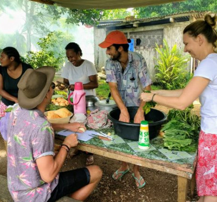 VSA ers Thomas and Chris and AVI Ann ccoking with the local community v6